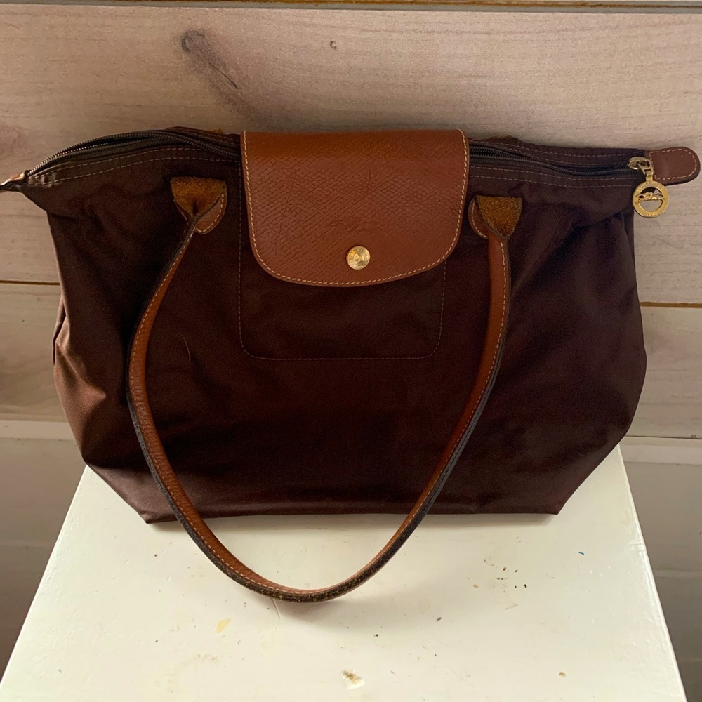 Longchamp small bag. It’s small, but holds more than you think! Pre-loved